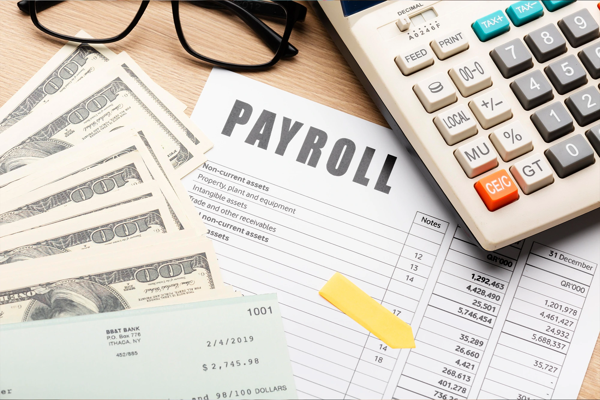 Financial expert managing payroll, accounts payable, and receivable services, highlighting Payroll Audit Cambridge.